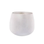 حوض نبات دائري، أسمنتي خرساني، أبيض اللون، عرض 40 سم، ارتفاع 35 سم.