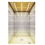 مصعد داخلي عالي السرعة بحمولة 800 كجم وسعة 10 ركاب، سرعة 2 م/ث، بجدران ستانلس ستيل مزينة وأرضية رخام