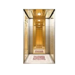 مصعد داخلي عالي السرعة حمولة 800 كجم، سعة 10 أشخاص، سرعة 2.5 م/ث، تصميم داخلي بجدران رخامية ومرآة تيتانيوم محفورة وأرضية PVC